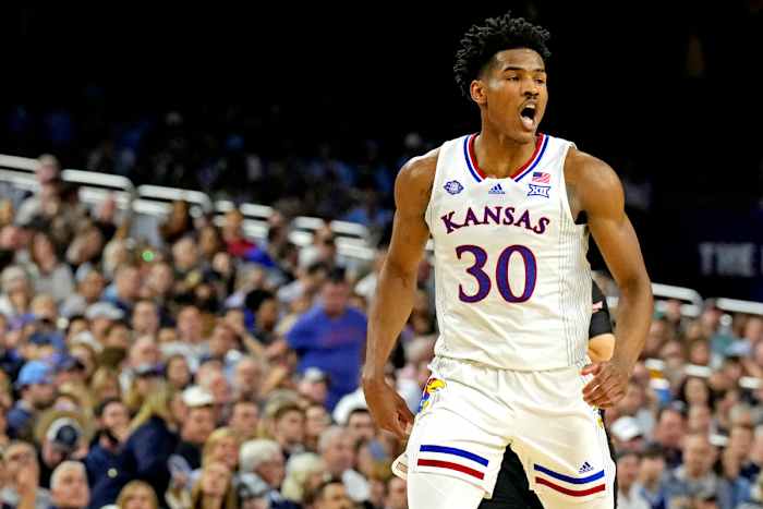 Kansas Jayhawks guard Ochai Agbaji (30) reacts after a play against the Villanova Wildcats in the 2022 NCAA men's basketball tournament Final Four semifinals at Caesars Superdome.